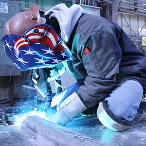 man welding